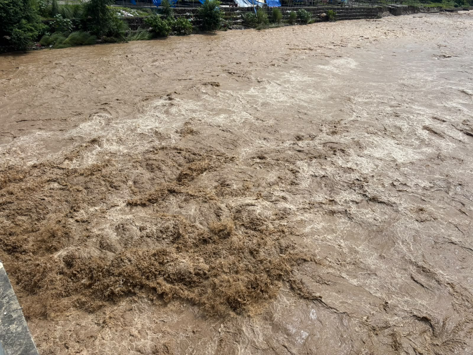 तिनाउ नदीमा शव फेला